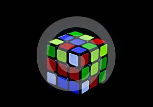 Rubik`s Cube on black background .