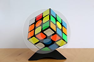 Rubik`s Magic 3x3 Speedcube on a Cube Stand