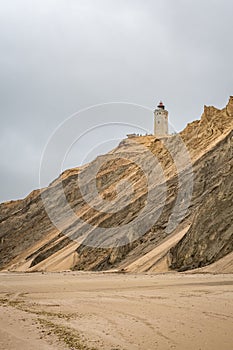 Rubjerg Knude lighthouse in Denmark seen from the beach at the North Sea
