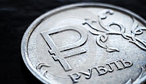 Ruble coin close-up, Russian money on black table