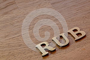 ruble word concept made of wooden letters rub on wooden background