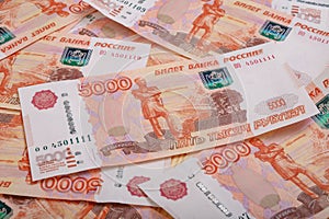 5000 rubles background. Russian banknotes at different angles.