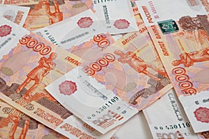 5000 rubles background. Russian banknotes at different angles.