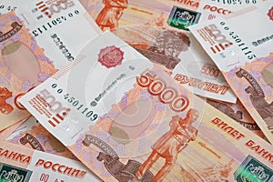 5000 rubles background. Russian banknotes at different angles.