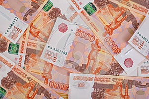 5000 rubles background. Russian banknotes at different angles.