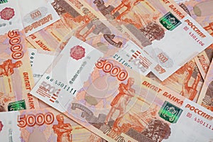 5000 rubles background. Russian banknotes at different angles.