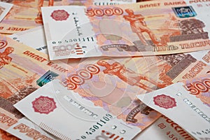5000 rubles background. Russian banknotes at different angles.