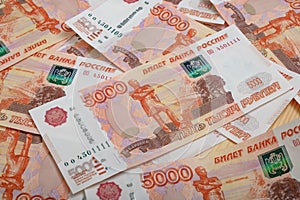 5000 rubles background. Russian banknotes at different angles.