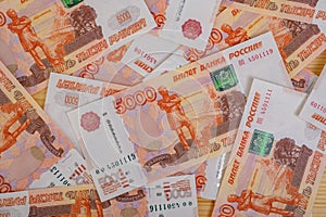 5000 rubles background. Russian banknotes at different angles.