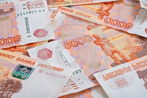 5000 rubles background. Russian banknotes at different angles.