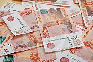 5000 rubles background. Russian banknotes at different angles.