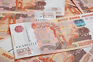 5000 rubles background. Russian banknotes at different angles.