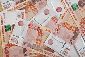 5000 rubles background. Russian banknotes at different angles.