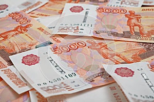 5000 rubles background. Russian banknotes at different angles.