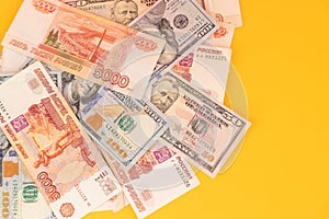 rubles lying on american dollars as a symbol of weakness russian national currency and strengthening of american dollar