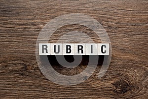 Rubric - word concept on building blocks, text