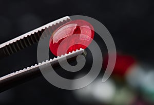 Ruby gemstone with dark blackground