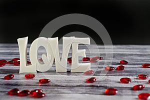 Ruby hearts around love