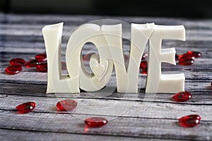 Ruby hearts around love