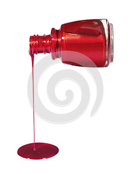 Ruby nail polish spilling from the bottle