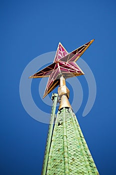 Ruby star of Spassky tower on the dark blue sky