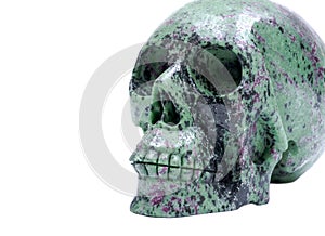 Ruby Zoisite realistic crystal carved skull isolated on white