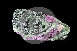 Ruby zoisite specimen, on black background.