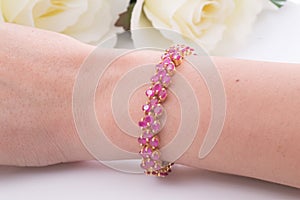 ruby â€‹â€‹gold bracelet on the white background