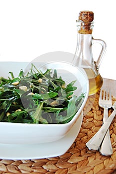 Rucola salad and olive oil