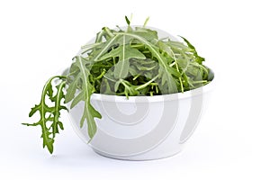 Rucola in white bowl