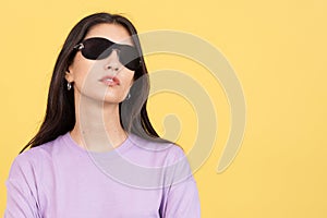 Rude woman with sunglasses looking at camera