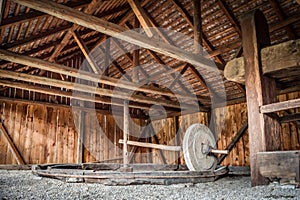 Rudimentary type of wheat mill used in Romanian villages photo