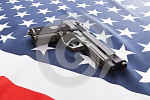 Ruffled silk flag with hand gun over it series - United States of America