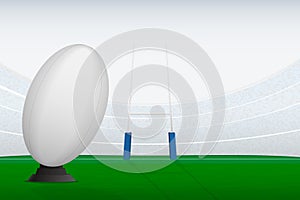 Rugby ball on stadium filed and rugby goal posts