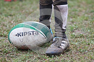 Rugby element under 8 years: shoes and ball