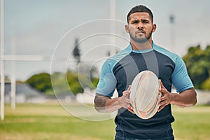 Rugby, field and portrait of man with ball, serious expression and confidence in winning game. Fitness, sports and