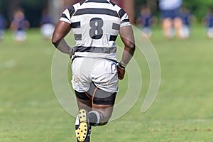 Rugby Player Game Decapitated Running Close-Up Rear Behind