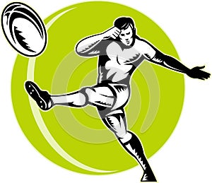 Rugby player kicking ball