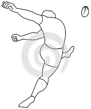 Rugby player kicking ball