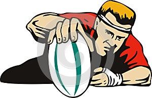 Rugby player scoring a try