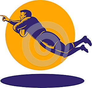 Rugby player scoring a try