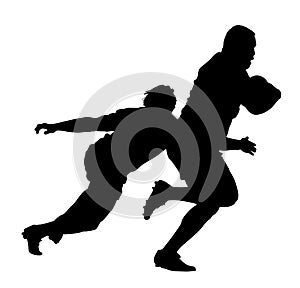 Rugby Player Tackling Runner With Ball