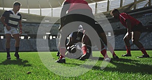 Rugby players playing rugby match in stadium 4k