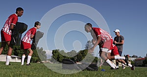 Rugby players training on the field