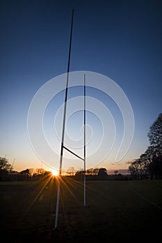 Rugby posts at sundown on local pitch
