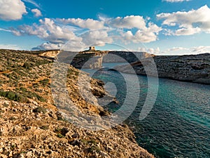 Rugged beauty of Malta\'s rocky shores from above an aerial photo revealing the island\'s untamed coastal allure