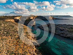 Rugged beauty of Malta\'s rocky shores from above an aerial photo revealing the island\'s untamed coastal allure