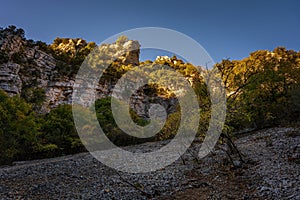 Rugged cliffs along the Blanc-Martel hiking trail in La Palud-sur-Verdon, France under sunlight