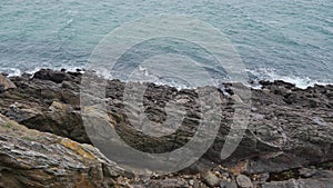 Rocky Cliff and Turquoise Sea in the Beautiful Breton Coast photo