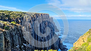 Rugged Coastline and diorite cliffs at Cape Raoul Tasmania photo